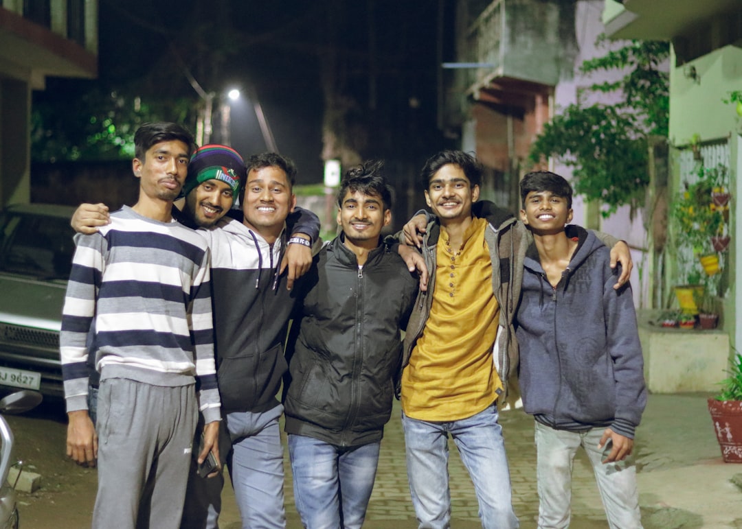 a group of men standing next to each other