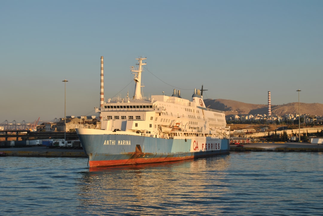 white and brown ship on sea during daytime
