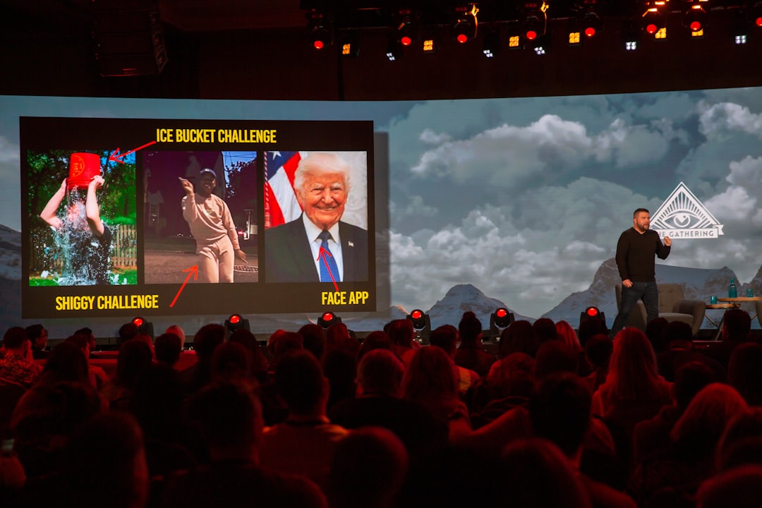 people watching man in black suit jacket