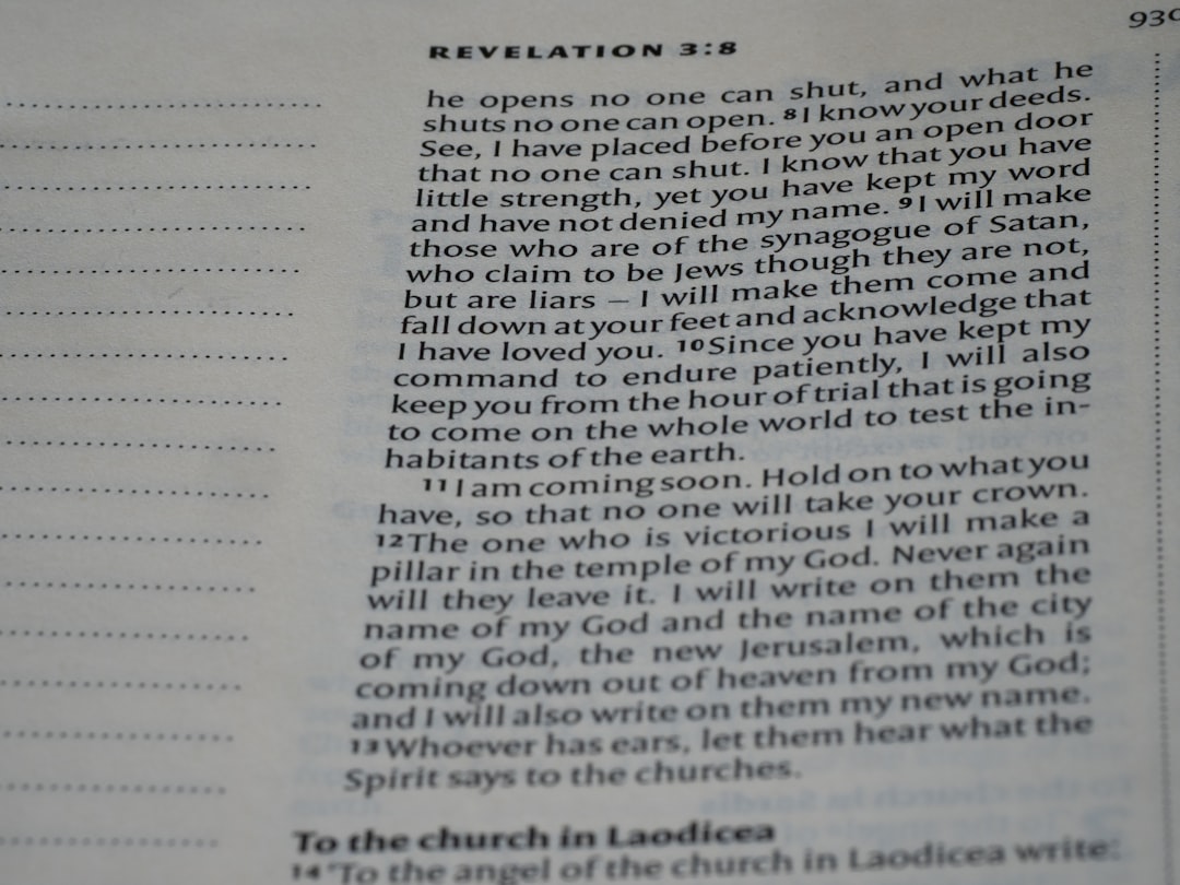 The image displays a passage from the book of revelation.