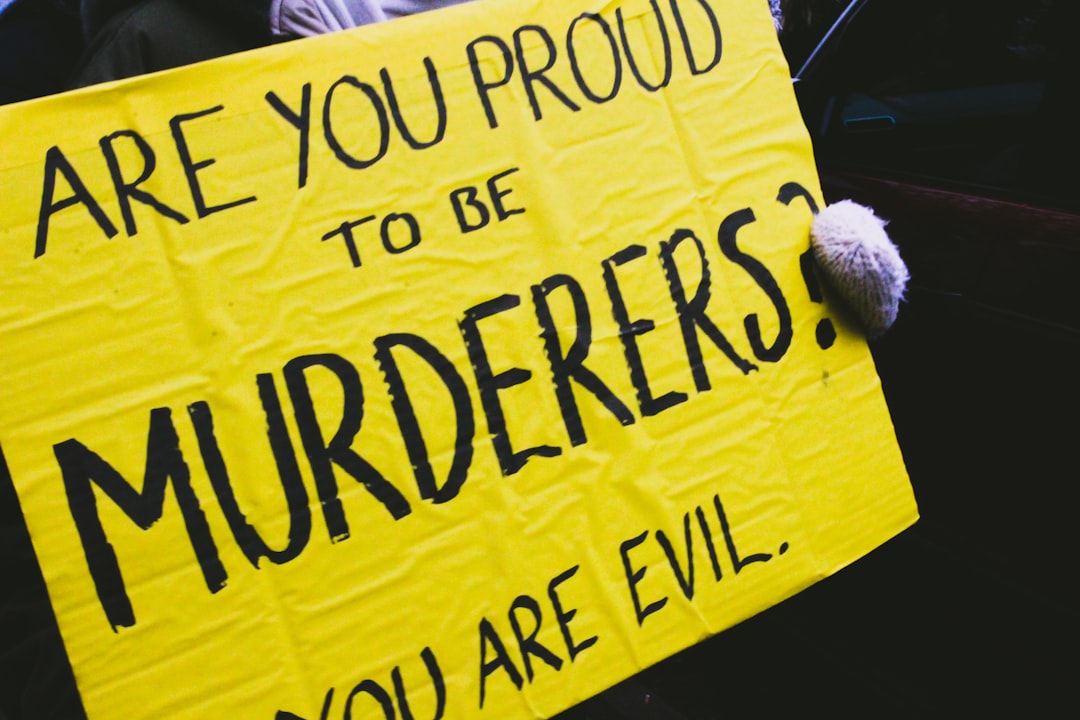 are you proud to be murderers? you are evil. signage