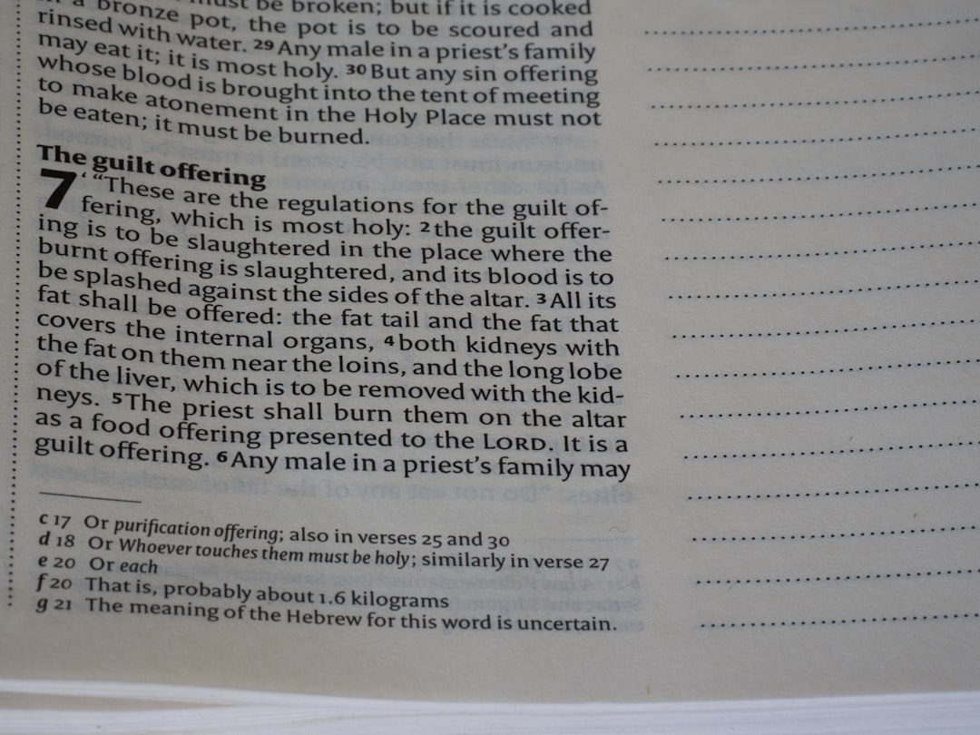 Close-up of a page from a book with text.